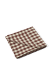 Ferm Living Bothy Check table cloth with red, black, and white check pattern, made of fabric for table decoration and protection.