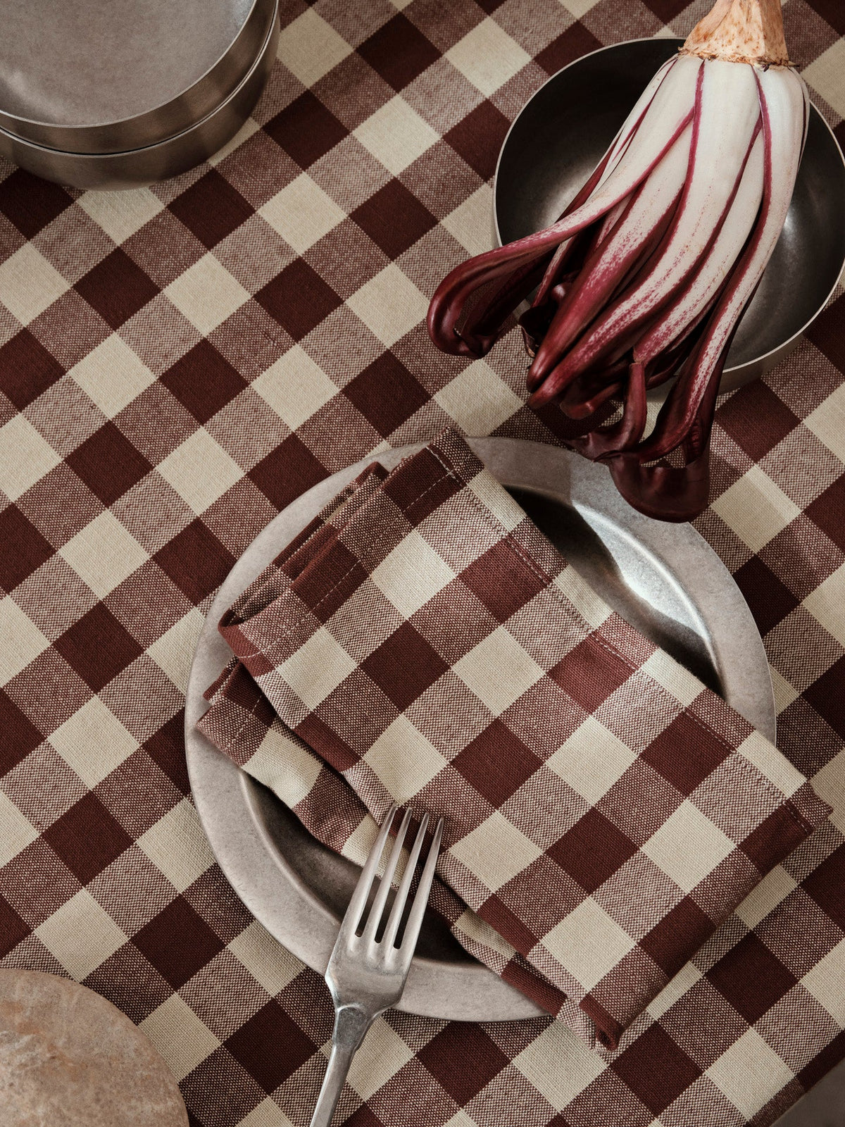 Ferm Living Bothy Check Table Cloth with red and white plaid pattern, designed as a stylish table accessory.