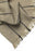 Ferm Living Calm Blanket in soft, neutral fabric, styled as cozy home accessory with textured weave and fringed edges.