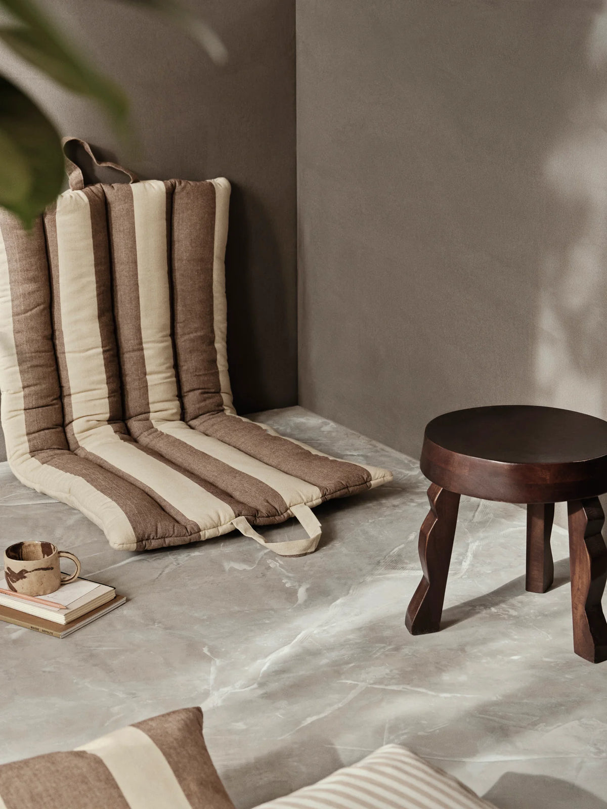 Ferm Living Strand Folding Mat accessories in neutral tones, featuring a textured woven pattern and foldable design.