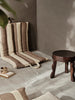 Ferm Living Strand Folding Mat accessories in neutral tones, featuring a textured woven pattern and foldable design.