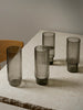 Ferm Living Ripple Long Drink Glasses with frosted finish, elegant accessories for serving beverages in a stylish home bar.
