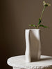 Large off-white Moire Vase by Ferm Living, a stylish decorative accessory with a textured pattern.