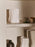 Large off-white Moire Vase by Ferm Living, a stylish decorative accessory with textured fabric-like pattern.