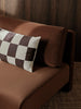 Fold Patchwork Cushion by Ferm Living featuring patchwork design in natural, undyed fabric, styled as a cozy accessories piece.