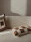 Fold Patchwork Cushion by Ferm Living, undyed accessories featuring patchwork design in natural tones.