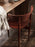 Black Herman Dining Chair by Ferm Living, wooden seat and backrest, modern Scandinavian-style seating for dining rooms.
