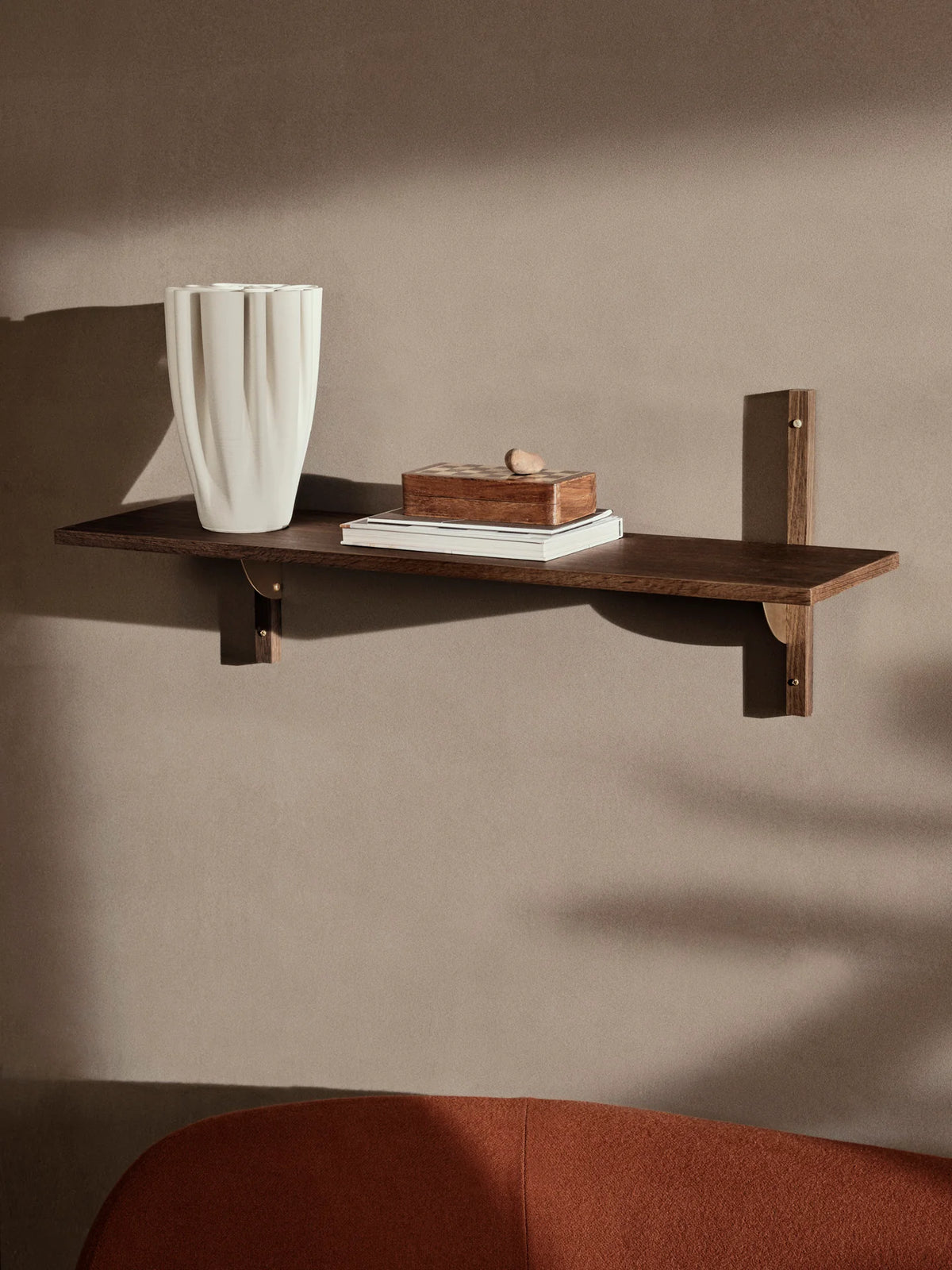 Ferm Living Sector Shelf in smoked oak with brass accents, single wide storage unit with sleek, modern design.