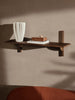 Ferm Living Sector Shelf in smoked oak with brass accents, single wide storage unit with sleek, modern design.