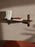 Ferm Living Sector Shelf in smoked oak with brass accents, single wide storage unit with sleek, modern design.