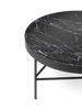 Black marble table by Ferm Living, medium-sized table with a sleek, modern design and smooth marble surface.