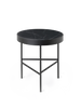 Black medium marble table by Ferm Living, showcasing sleek design and polished surface, perfect for modern interior decor.