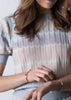 Gold-plated Omega bangle by Skultuna, stylish jewelry accessory with a sleek, polished finish on a neutral background.