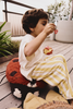 Kids' Maria the Ladybug floor cushion by Lorena Canals featuring a red ladybug design on soft fabric for comfortable seating.