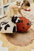 Kids' Maria the Ladybug Floor Cushion by Lorena Canals featuring a colorful ladybug design for children’s room decor.