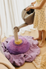Kids purple Poppy floor cushion by Lorena Canals featuring a soft, plush fabric with floral Poppy design for cozy comfort.
