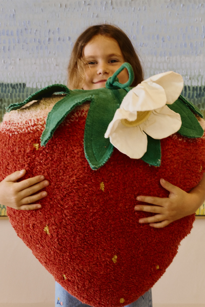 Kids strawberry floor cushion by Lorena Canals featuring a soft fabric cover with a playful strawberry design.