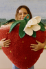 Kids strawberry floor cushion by Lorena Canals featuring a soft fabric cover with a playful strawberry design.