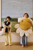 White Daisy kids floor cushion by Lorena Canals featuring a soft, plush fabric with a floral daisy design for cozy seating.