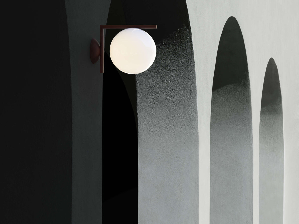 Black Flos IC Lights outdoor ceiling and wall lighting fixture, modern design for exterior illumination.
