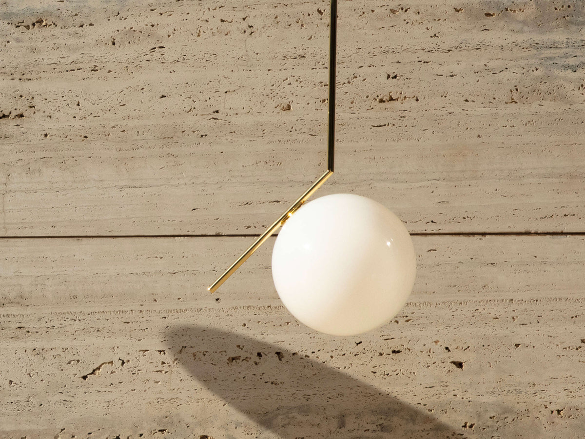 Chrome IC Lights Suspension by Flos lighting fixture with sleek, modern design and multiple hanging light bulbs.