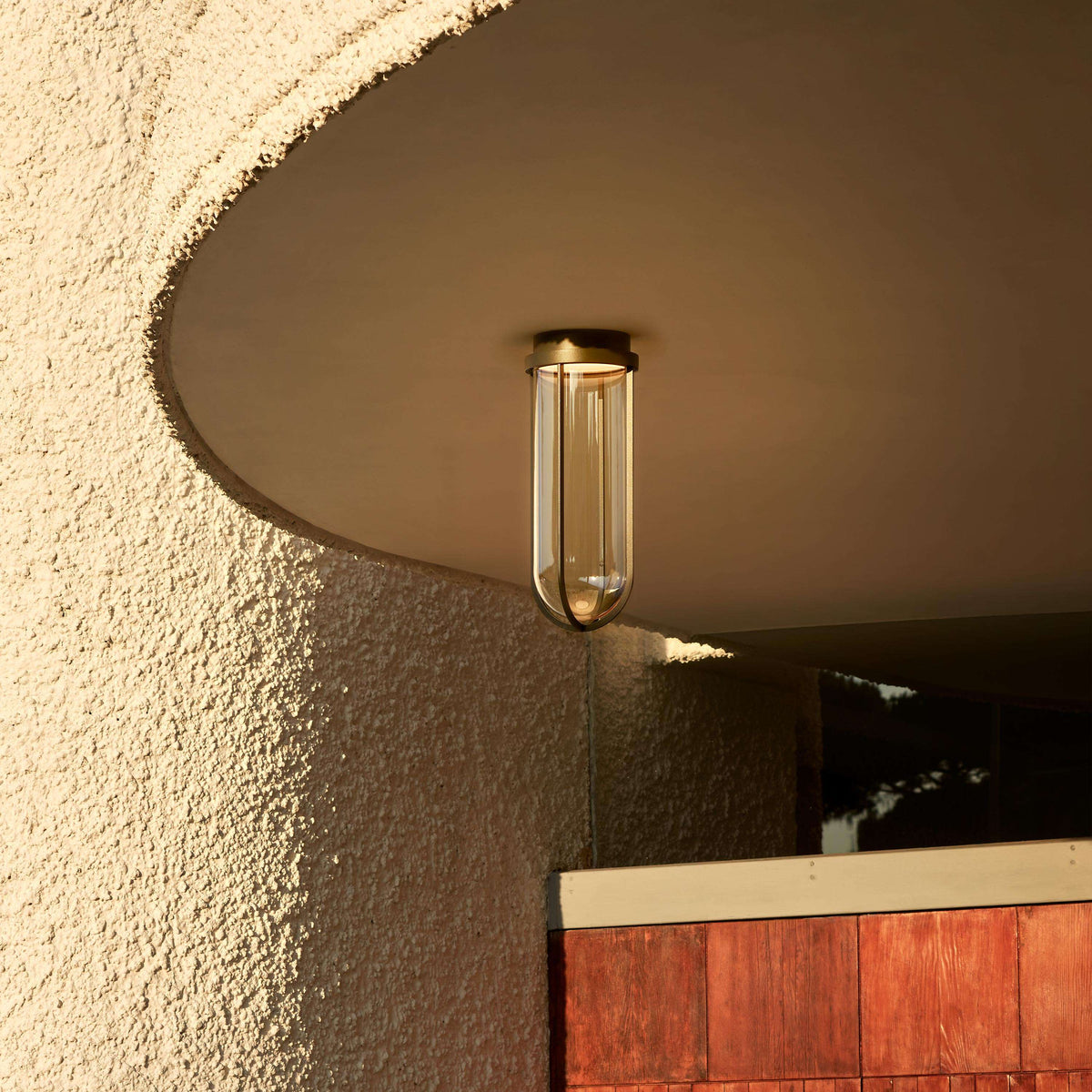 Flos In Vitro outdoor ceiling lighting fixture with sleek, modern design and diffused light for exterior spaces.