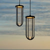 Outdoor In Vitro Suspension lighting by Flos showing a sleek, modern pendant light with a smooth, rounded design.