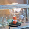Orange Flos Lampadina lighting bulb with a sleek, modern design, showcasing its vibrant color and contemporary style.