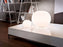 White Glo-Ball Basic Zero Switch table lamp by Flos with a sleek, rounded design and soft illumination for modern lighting.