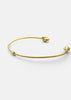 Gold-plated Knot Cuff by Skultuna, a stylish accessories piece featuring a twisted knot design in shiny gold finish.