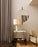 Gubi Gravity Table Lamp with sleek, modern design featuring a weighted base and minimalist lighting element on a white background.
