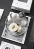 Lisa Larson x Skultuna box accessory with intricate design, crafted by Skultuna, displayed on a white surface.
