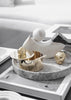 Lisa Larson x Skultuna decorative box, handcrafted accessories with intricate design, made of metal, on a neutral background.
