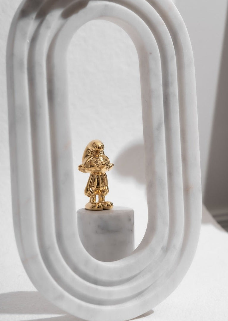 Grouchy Smurf accessory by Skultuna from Smurfs x Skultuna collection, featuring a detailed figurine on a neutral background.