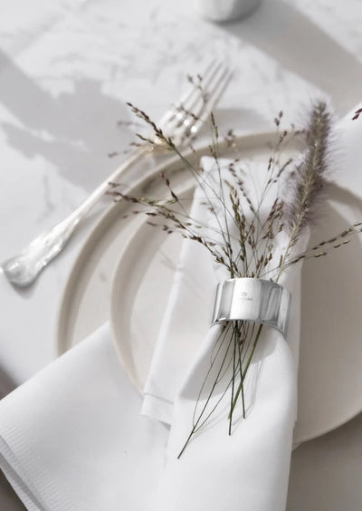 Set of 2 silver-plated Skultuna napkin rings with elegant circular design, perfect for table accessories.