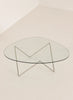 Pedrera coffee table by Gubi featuring chrome finish, smoke-colored structured glass top and modern table design.