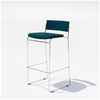 Hinoki Barstool by Bend Goods featuring a sleek, modern seating design with a chrome finish and wooden accents.