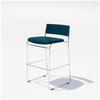 Hinoki counter stool by Bend Goods featuring a modern seating design with a natural wood finish and sleek metal frame.