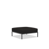 Muted white LEVEL2 Ottoman by Houe, modern seating with leaf design, featuring a sleek, contemporary style and comfortable cushion.