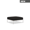 Muted white Level2 Ottoman by Houe, a modern seating piece with a sleek, minimalist design and leaf-shaped base.