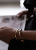 Gold plated Massive Knot Cuff bracelet by Skultuna, featuring a bold knot design and sleek metallic finish.