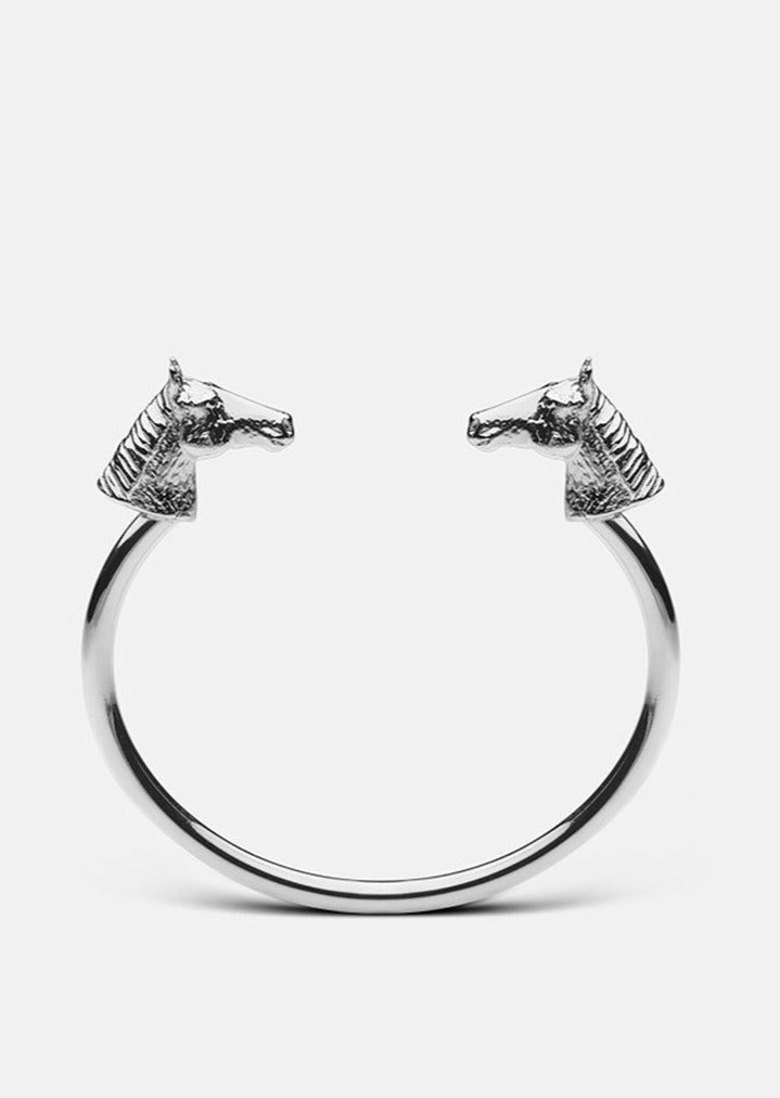 Silver plated GTG Horse cuff by Skultuna, a stylish horse-themed accessory with intricate detailing and a polished finish.
