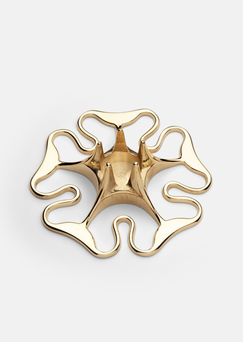 Skultuna Rose Candle Holder accessory featuring a delicate rose design, crafted in metal for elegant home decor.