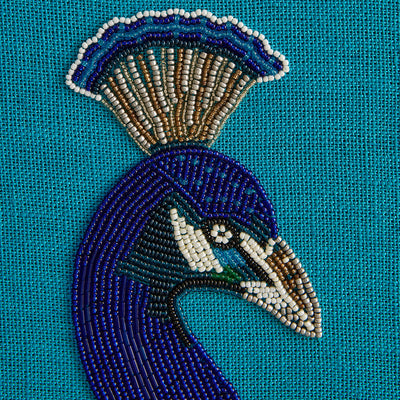 Décoration murale paon en perles par Jonathan Adler