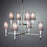 Jonathan Adler Ventana two-tier chandelier with antique brass finish, featuring multiple light fixtures and elegant design.