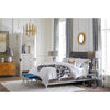 Brass Meurice Chandelier by Jonathan Adler, elegant lighting fixture with multiple arms and decorative details.