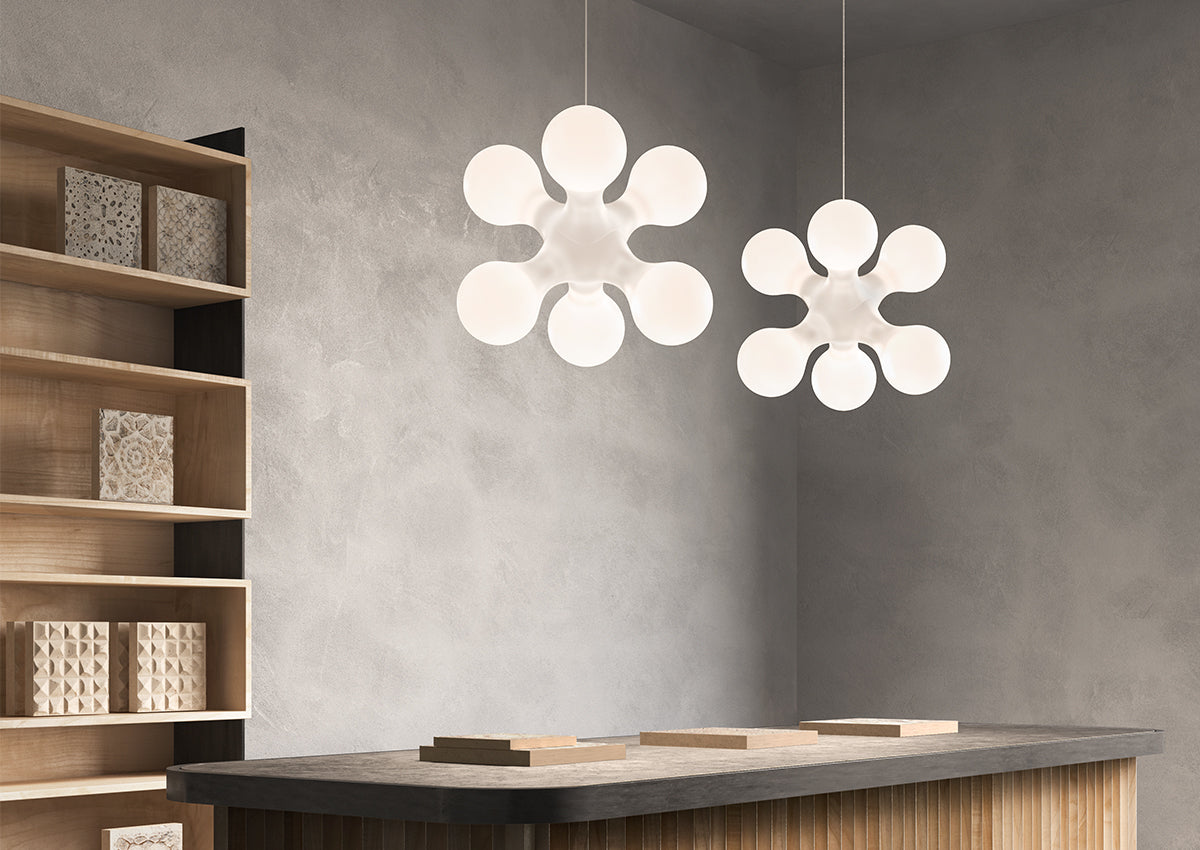 Contemporary Atomium Suspension lighting fixture by KDLN with spherical metal design, hanging from a ceiling.