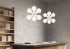 Contemporary Atomium Suspension lighting fixture by KDLN with spherical metal design, hanging from a ceiling.