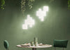 Pixel by KDLN lighting fixture featuring modern, sleek design with adjustable LED panels for versatile illumination.
