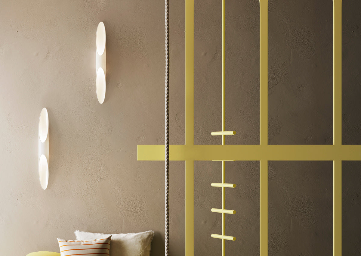 KDLN Shakti Wall lighting fixture with modern design, featuring sleek metal finish and integrated LED illumination for contemporary interiors.